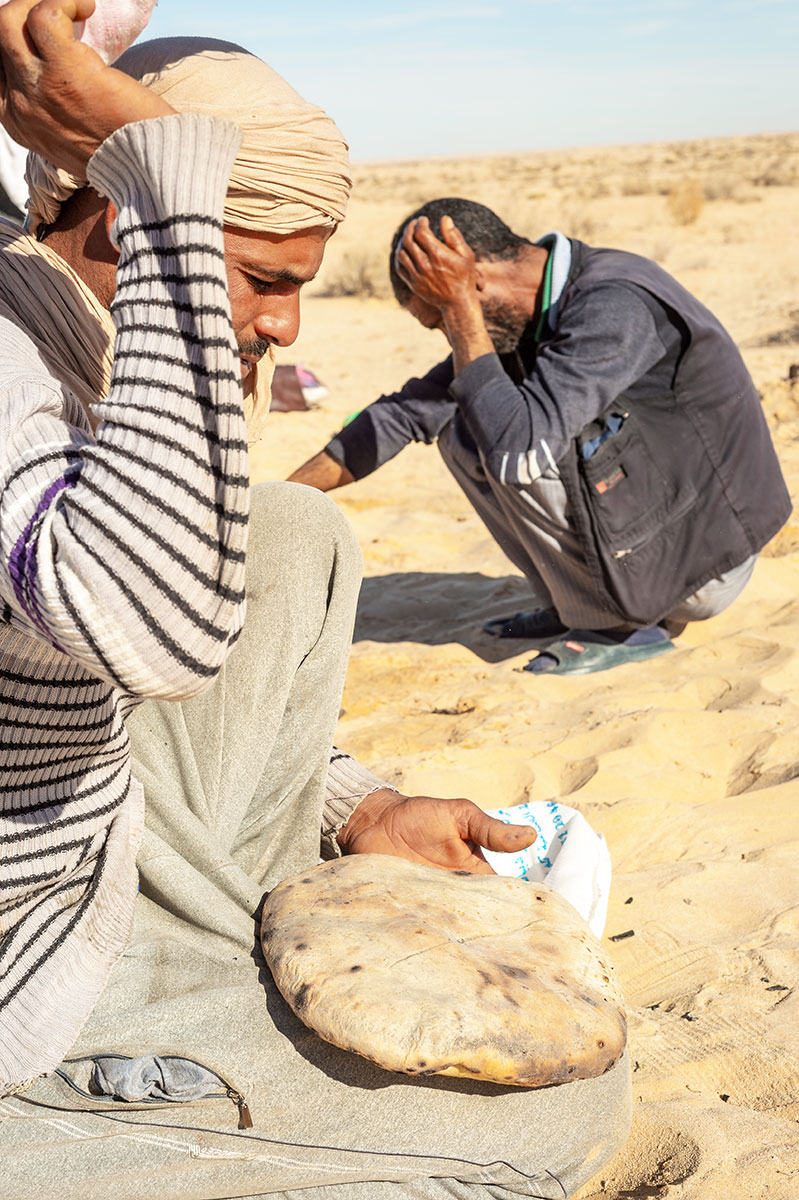 Traditional galette baked under Saharan sand